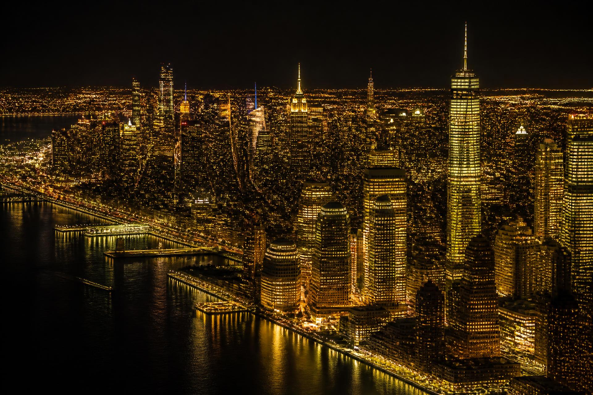 Manhattan illuminated at night beneath the Centurion Lounge